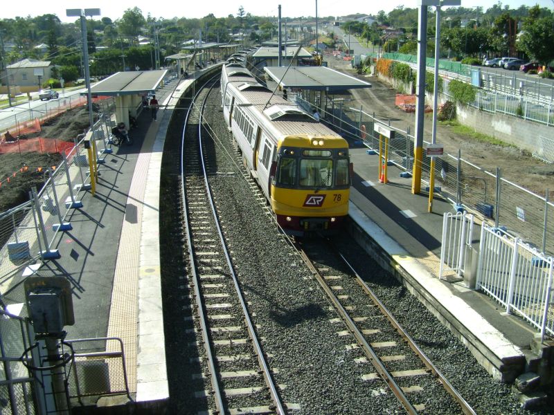 EMU 78 at Darra
EMU 78 at Darra. Early works for the station upgrade and track amplification had commenced. August 2009
