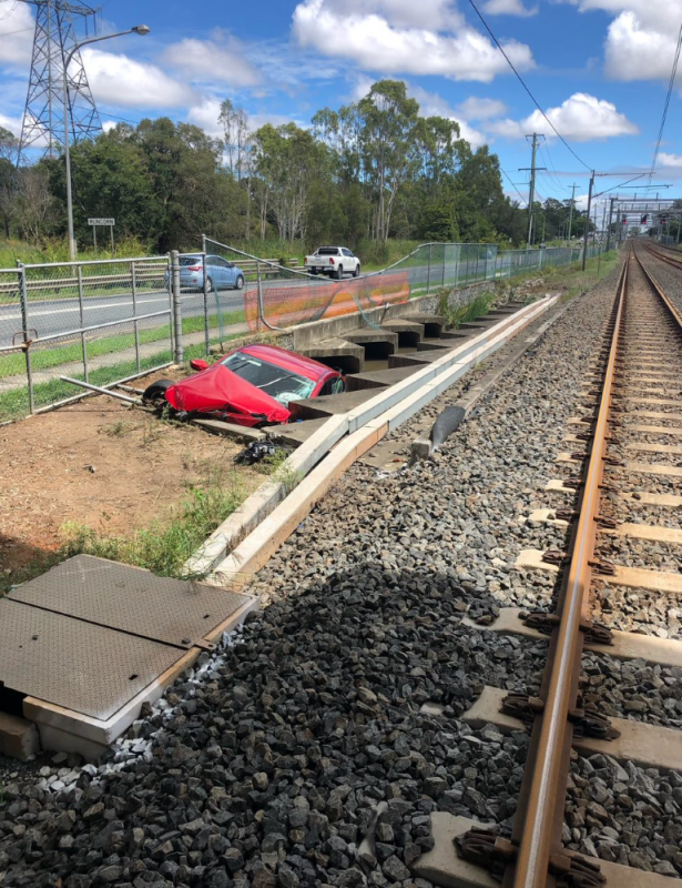 Kuraby
Car in drain.
